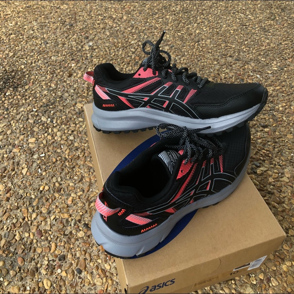 Pink and black sneakers